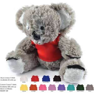 A grey plush koala toy with a red shirt, featuring black paws and a branding logo. Various shirt colour options below.