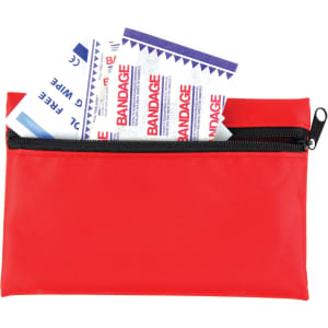 A red zippered pouch containing adhesive bandages and a first aid kit.