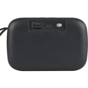 A Jive Speaker with a smooth black exterior featuring a USB port, a charging port, and a power switch on a flat surface.