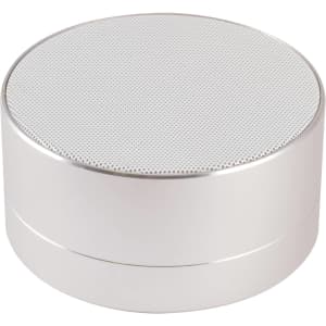 A Bluetooth speaker featuring a sleek, round design with a silver finish and a textured speaker surface.