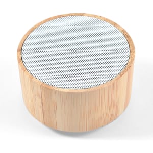 A bamboo Bluetooth speaker featuring a circular design with a perforated upper surface.