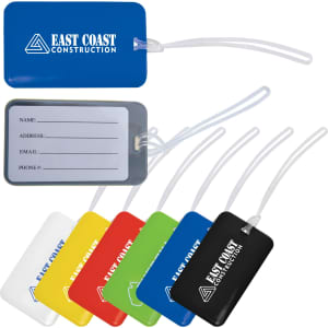 A collection of colourful luggage tags in blue, red, yellow, green, white, and black, featuring a clear insert for details.