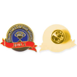 A gold and blue die struck soft enamel badge featuring a trophy and a red ribbon with a logo on the reverse side.