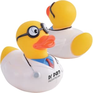 A novelty bath duck in yellow, wearing a doctor's coat, glasses, and stethoscope, with a logo on its side.