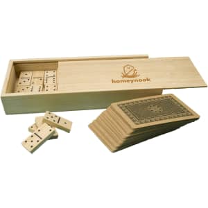 A bamboo storage box containing dominoes and a deck of playing cards, featuring a logo on the box.