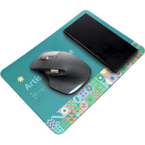 A teal mouse pad with a patterned edge, featuring a smartphone and a wireless mouse on its surface.