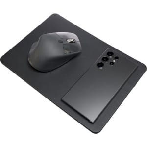 A sleek black mouse pad with an integrated wireless charger, featuring a smartphone and a computer mouse on top.