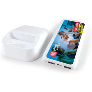 A white power bank with multiple ports and a colorful graphic design on one side.