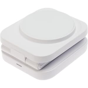 A compact white wireless charger featuring a circular charging pad and a foldable design for portability.