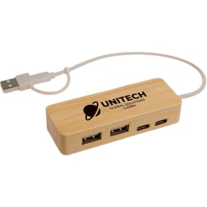 A bamboo USB hub with three ports and a connected USB cable. It features a logo on its surface.