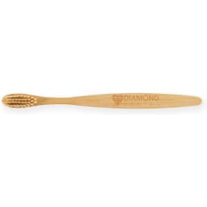 A bamboo toothbrush featuring a sleek design, with a logo engraved on the handle.