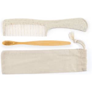 A beige toiletry bag containing a wooden toothbrush and a beige comb with a speckled design.