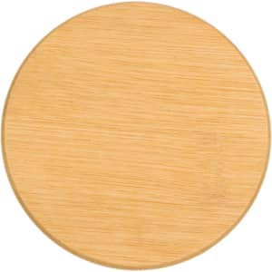 A round bamboo coaster with a smooth, natural finish. It features a light wood colour and has no visible branding.