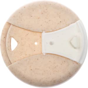 A reusable coffee cup featuring a cork band and a textured exterior, designed for eco-friendly use.