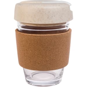 A reusable coffee cup featuring a clear glass body, a cork band for grip, and a light-colored, speckled lid.