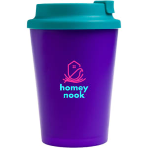 A reusable coffee cup with a vibrant purple body and a teal comfort lid, featuring the logo "homey nook."