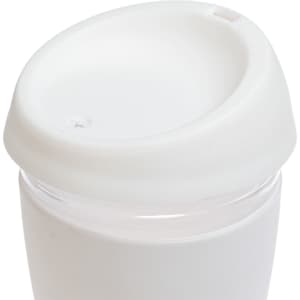 A reusable coffee cup featuring a clear body and a white silicone lid.
