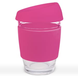 A reusable coffee cup with a pink silicone lid and a clear glass body, featuring a built-in logo.