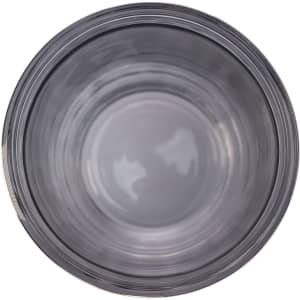 A reusable coffee cup with a transparent design and a snap lid, featuring a smooth interior surface.
