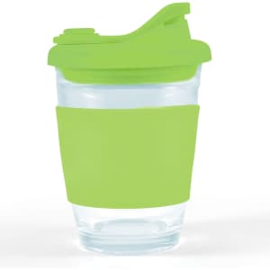 A reusable coffee cup with a clear body and a vibrant green silicone sleeve and snap lid.