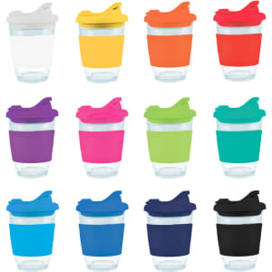 A collection of reusable coffee cups in various colors, each with a snap lid and a clear base.