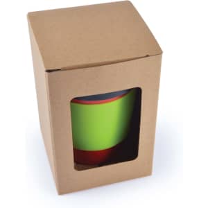 A reusable coffee cup in vibrant green, packaged in a cardboard box with a clear window.