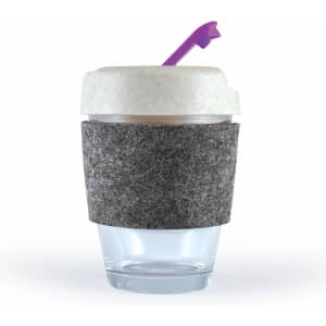 A reusable coffee cup with a clear base, grey felt band, and a cream-colored lid with a purple straw.