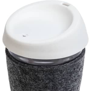 A reusable coffee cup featuring a glass body, a silicone lid, and a textured RPET band for grip.