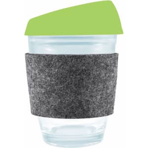 A reusable coffee cup featuring a clear design, a green silicone lid, and a gray felt band for grip.