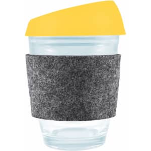 A reusable coffee cup featuring a transparent body, a bright yellow silicone lid, and a gray RPET band for insulation.