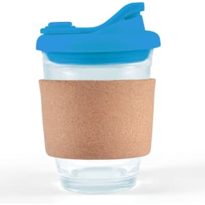 A reusable coffee cup with a clear body, blue snap lid, and a cork band for grip.