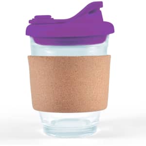 A reusable coffee cup featuring a clear glass body, a cork band, and a purple snap lid.