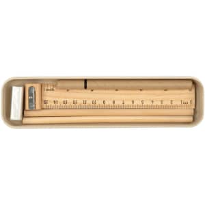 A stationery set featuring a ruler, pencil, sharpener, and eraser, all housed in a sleek, neutral-colored case.