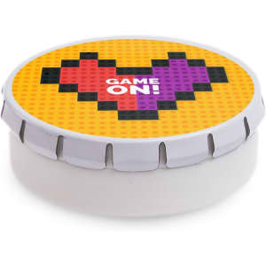A round mint tin with a colorful pixelated heart design in red and purple on a yellow background.