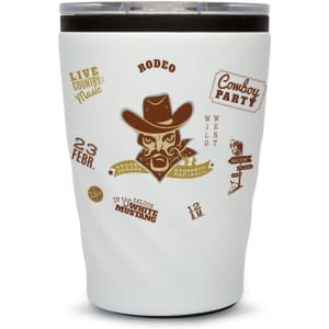A reusable coffee cup in white featuring a cowboy graphic and a dark lid, with various decorative elements.