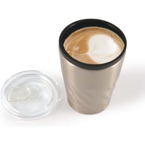 A reusable coffee cup in metallic silver with a black lid, containing a latte with a foamy design on top.
