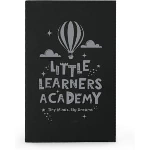 A black notebook featuring a hot air balloon design and the text "Little Learners Academy".