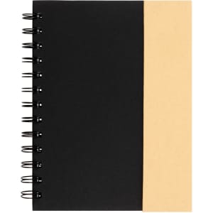 A Trek Notebook featuring a black cover with a contrasting tan section, spiral binding on the side.