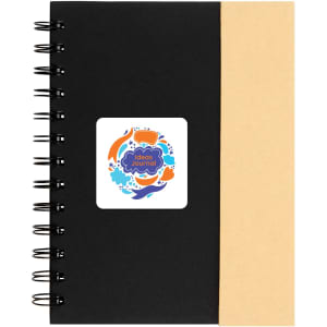 A spiral-bound notebook featuring a black cover with a tan spine and a logo on the front.
