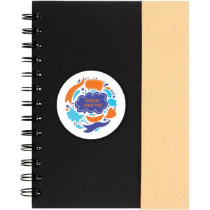A black spiral-bound notebook with a tan cover and a circular logo on the front.