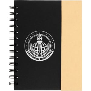 A black spiral notebook with a natural kraft cover on one side and a logo on the front.