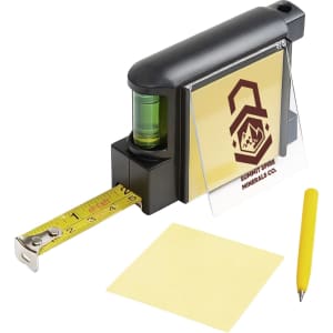 A black contractor tape measure with a yellow measuring tape, a level bubble, a yellow pen, and a sticky note.