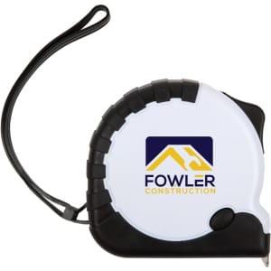 A white and black retractable tape measure with a logo, featuring a textured grip and a wrist strap.