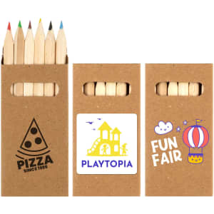 A pencil set with coloured pencils in various shades, housed in a cardboard box featuring a logo and two designs.