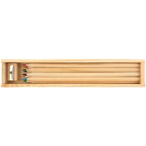 A wooden box containing a set of five coloured pencils in various colors, including green, red, and blue, with a sharpener.