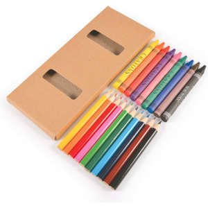 A pencil and crayon set with various colors arranged next to a brown cardboard box featuring two windows.