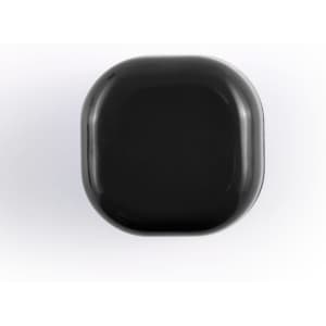 A black cube lip balm with rounded edges, featuring a branding logo on the surface.