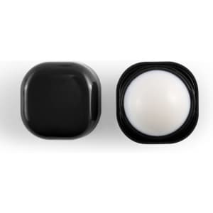 A black cube-shaped lip balm container with a white balm center, featuring a sleek design and logo.