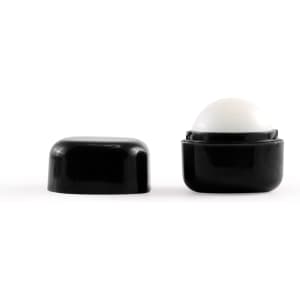 A black cube lip balm container with a white lip balm sphere on top, featuring a removable lid.