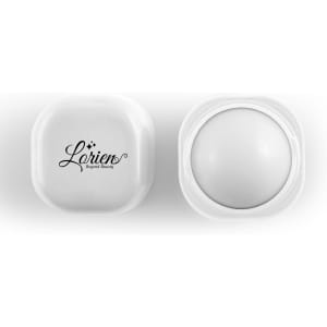 A square, white lip balm container with a rounded top and a logo on the lid. The balm appears smooth and white inside.